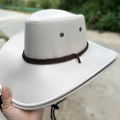 Men's off-white faux suede western cowboy hat with brown braided cord and chin strap - One Size 58cm Circumference / White