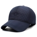 Dark blue quilted baseball cap with ear flaps and warm lining for men in winter - Adjustable / Navy Blue