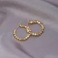 Elegant gold hoop earrings with small geometric cubes on purple satin fabric - Square Bead Series / E-027---Gold