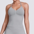 Detail of grey seamless halter neck sports bra with ruched front for yoga and gym - Light Gray