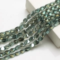 Detail of dark green translucent rectangle crystal beads for DIY jewelry and lighting - Yellow Green Iridescent