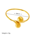 Golden titanium steel open bracelet with unique spiral coil design and 58mm inner diameter - Hollow Spiral / Gold