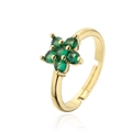 Macro shot of 18K gold plated flower ring with green zircons and mirror reflection - Adjustable Open / Green