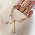 Elegante pulsera de perlas naturales de agua dulce y cristales púrpuras dorados - Estilo de Perla de Cristal Púrpura