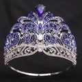 Detailed macro view of Miss World style silver crown with blue and clear rhinestones - Silver/Blue Zirconia