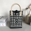Knitted houndstooth tote bag featuring a black number 8 and sunflower accent handle - Black Lucky Number 8 Pattern