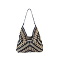Handmade straw shoulder bag with beige and dark blue geometric patterns on white background - Blue