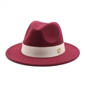 Detail of burgundy wool fedora featuring a beige grosgrain ribbon and gold metal buckle - Burgundy