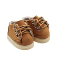 Detail view of miniature brown doll sneakers with white soles and laces on white background - Brown