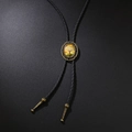 Vintage bolo tie met zwart gevlochten lederen koord en levensboom medaillon - Antiek Brons Levensboom