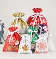 Christmas drawstring gift bags with Santa and reindeer designs in multiple sizes - Set of 24