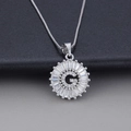 Silver letter G pendant necklace with sparkling cubic zirconia set in a round frame - Letter G / Silver