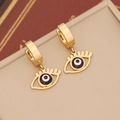 Macro view of gold evil eye drop earrings on a vintage leather jewelry box - Hollow Round Eye (8#)