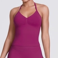 Close-up of seamless dark magenta ribbed knit texture on halter sports bra yoga top - Wild Berry