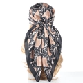 Silk satin square headscarf featuring a snake print pattern on a white background - Snake Pattern Black