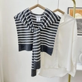 Grey and white striped knit faux wool shawl styled over a white shirt for layering - Dark Gray Stripes