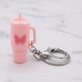 Pink silicone cup keychain with butterfly pattern and silver lobster clasp accessory - Pink Butterfly Cup Keychain