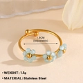 Adjustable golden stainless steel ring featuring three light blue beaded flower charms - 923G-3 / Blue Flower