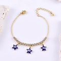 Bracciale a catena dorata con ciondoli a stella Evil Eye blu e zirconi bianchi lucidi - Pentagramma