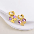 Boucles d'oreilles nœud dorées avec cristaux en cœur violets et ruban en métal - Boucles d'Oreilles Nœud Cœur Violet / Boucles d'oreilles