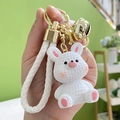 Cute white resin rabbit keychain with woven leather strap and golden metal bell - White Rabbit