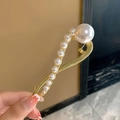 Elegant gold twist hair clip with polished pearls for a French minimalist style - Single Row Pearl Twist Clip - Gold