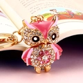 Pink enamel owl keychain with sparkling rhinestones in a golden metallic finish - Flower Owl Pink