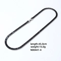 Flat lay of black zircon rectangle pendant necklace with 45cm length and 15g weight - Black