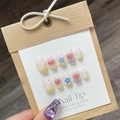 Short handmade press-on nails with star patterns, color gradient, and 3D butterfly charms - Transparent Red Yellow Blue Star Butterfly Style (831)
