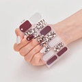 Model wearing DQ3-102 nail wraps set featuring burgundy, white, and leopard gold foil prints - Wine Red White Leopard Gold Foil Style (DQ3-102)