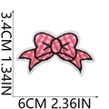 Macro view of pink embroidered butterfly patch showing detailed stitching and size dimensions - US 3