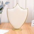 Shield-shaped cream velvet necklace display stand with elegant gold metal frame - Large Crown / Off White