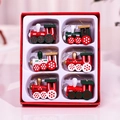 Set of 6 colorful wooden Christmas train ornaments in a festive red holiday gift box - Train Style / 6-Piece Set