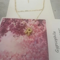 Double layered gold chain necklace featuring a crystal micro-paved letter R pendant - Letter R