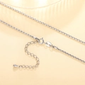 Detailed macro view of silver snake chain necklace with spring clasp and extension tail - XL1191 Snake Chain
