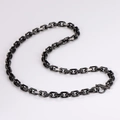 Detail of stainless steel O-chain necklace with OT buckle in a sleek S-curve layout - Black