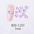 Macro view of 5mm aurora purple star-shaped glass rhinestones for nail art decoration - 5-Point Star - Purple Mocha (L257)