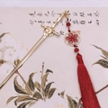 Golden sword hair pin with intricate floral pendant and long red silk tassel - Sword Tassel-Gold Red
