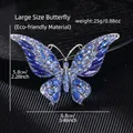 Macro view of large butterfly brooch with blue crystals measuring 8.8cm by 5.8cm - Large Butterfly Light Blue (YNCP5960)
