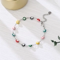 Close-up of colorful evil eye beads on a silver adjustable chain with lobster clasp - Multicolor Eyes Silver