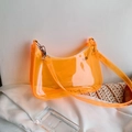 Chic orange transparent PVC jelly baguette bag with shoulder strap on white fabric - Orange