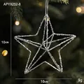 Sparkling silver glitter 3D star ornament hanging on Christmas tree branch - Silver Star