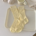 Pastel yellow crew socks with delicate bow pattern and ribbed texture in cream finish - One Size / Milky Yellow