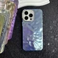 Macro detail of aurora gradient iPhone case featuring dynamic 3D wave texture and metal camera ring - Cloud Blue