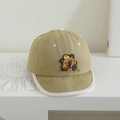 Detail of baby cotton cap featuring a cartoon bear pilot patch and white trim edge - 1-2 Years (48-50cm) / Light Green