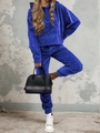 Close-up of royal blue velvet tracksuit featuring soft hoodie texture and ribbed cuffs - Blue