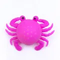 Pink crab squeeze toy made of soft silicone for bath time and stress relief fun - Pink Bath Crab