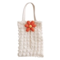 Close-up of cream textured bubble fabric tissue bag with orange flower decoration - Beige Bubble Fabric-Orange Large 6-Petal Flower