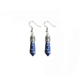 Detail view of blue hexagonal lapis lazuli crystal dangles with silver floral caps - Lapis Lazuli