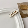 Detail of cream oval hair clip with black border on decorative plate - 8# White Oval Hollow Out